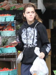 Kiernan Shipka in a Black Hoody