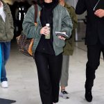 Lena Meyer-Landrut in a Green Bomber Jacket Arrives at Nice Airport in Nice 05/19/2019