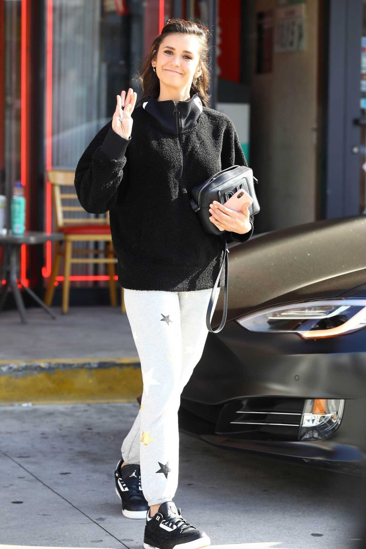 Nina Dobrev in a Gray Sweatpants Leaves a Smoke Shop in Hollywood 05/04