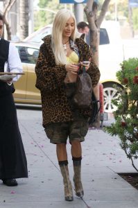 Pia Mia in a Leopard Print Jacket