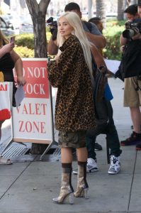 Pia Mia in a Leopard Print Jacket