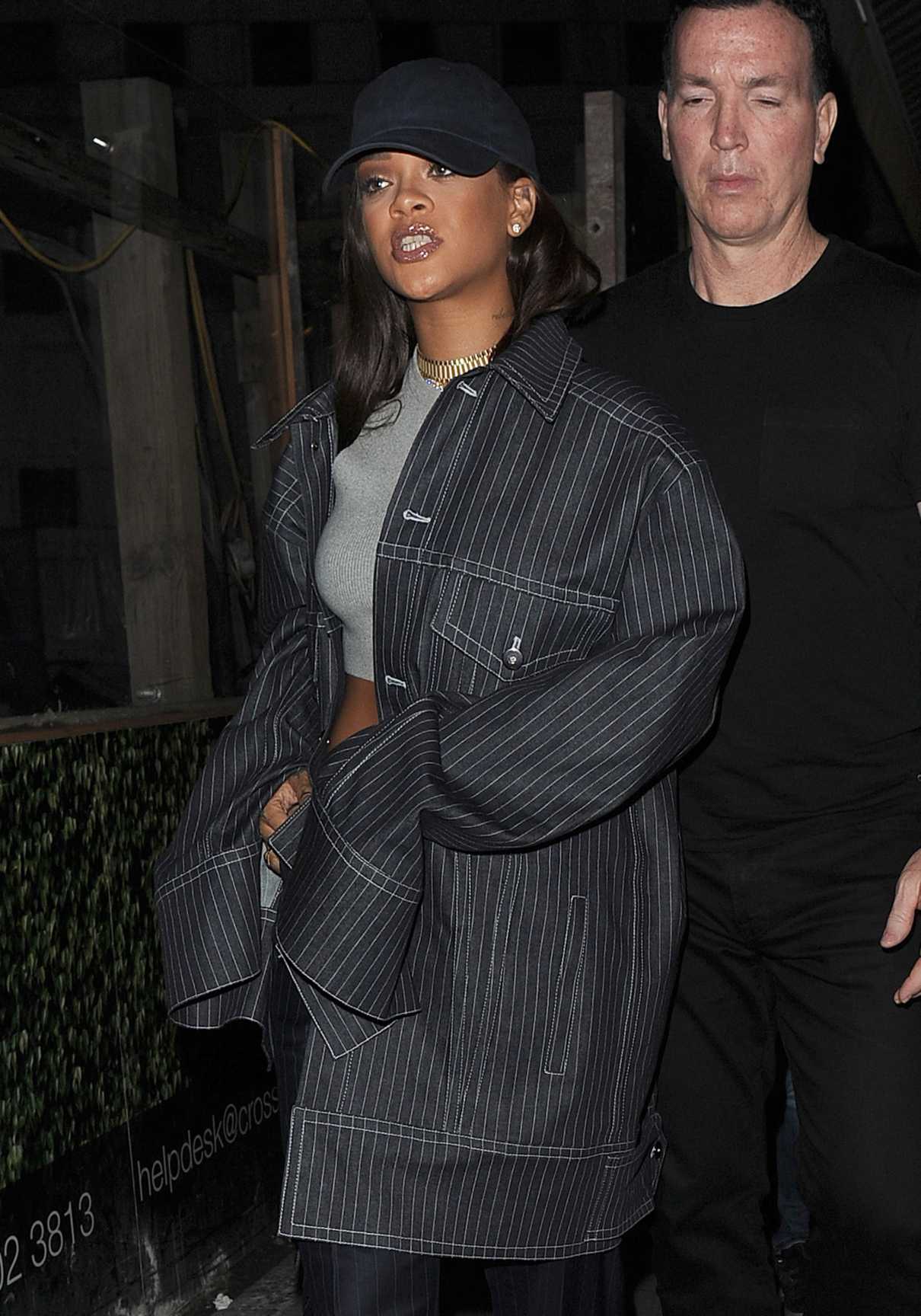 Rihanna in a Black Oversized Striped Jacket