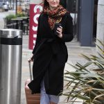 Dakota Blue Richards in a Black Coat Leaves the Costa Coffee in Manchester 06/21/2019
