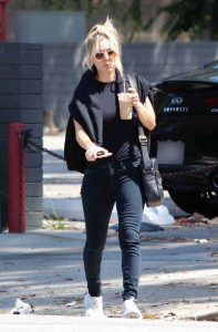 Kaley Cuoco in a Black Tee