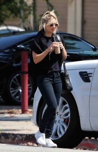 Kaley Cuoco in a Black Tee