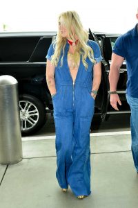 Kesha in a Blue Denim Jumpsuit