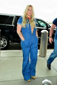 Kesha in a Blue Denim Jumpsuit