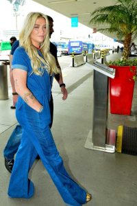 Kesha in a Blue Denim Jumpsuit