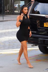 Kim Kardashian in a Black Form Fitting Dress