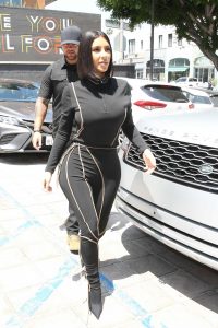 Kim Kardashian in a Black Form Fitting Suit