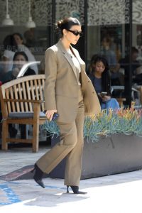 Kourtney Kardashian in a Beige Suit