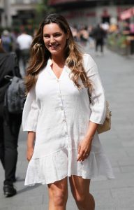 Kelly Brook in a Short White Dress