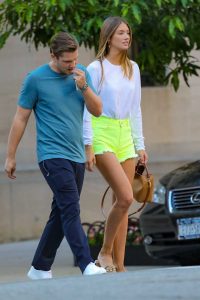 Lorena Rae in a Neon Green Shorts