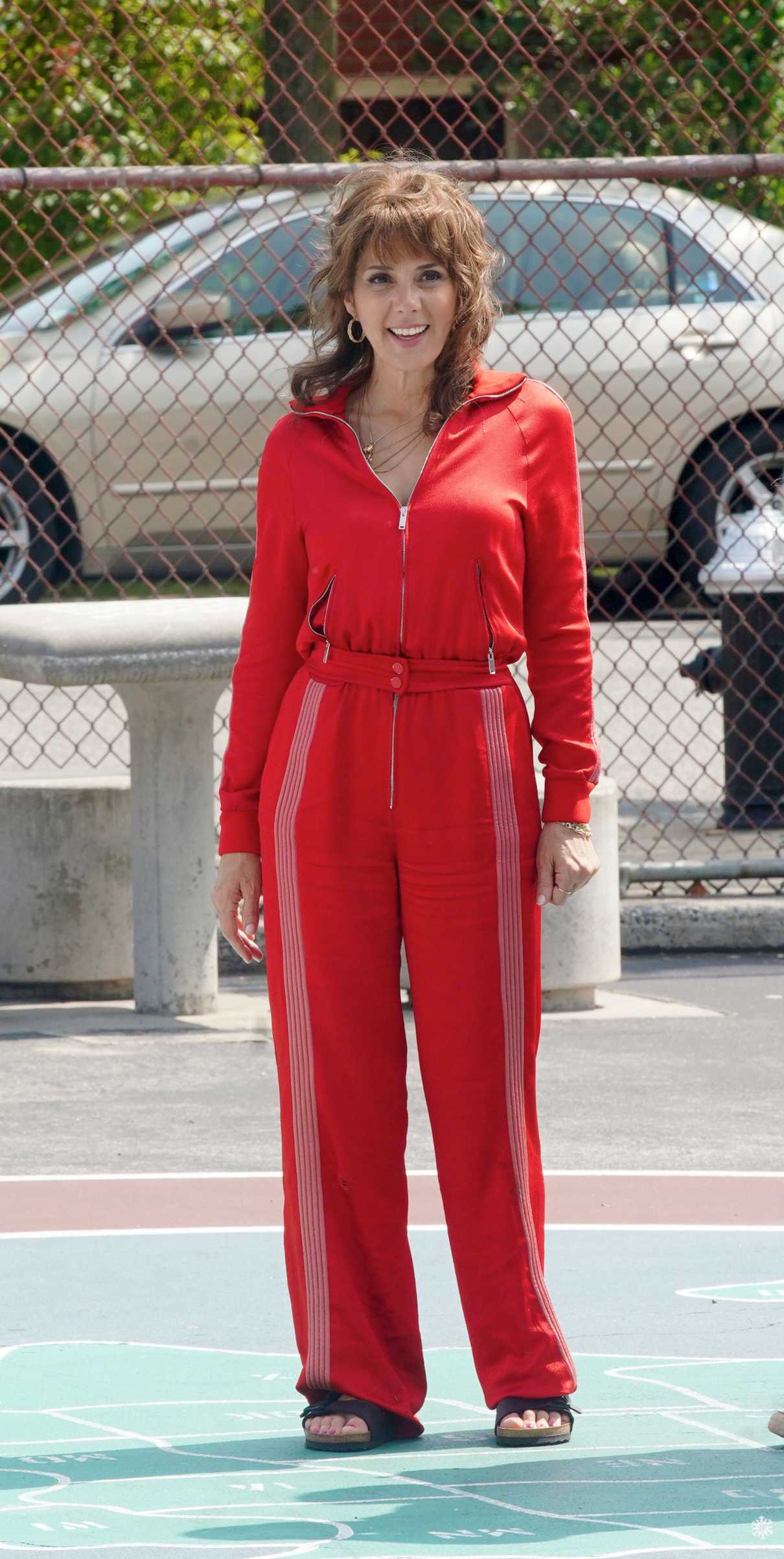 Marisa Tomei in a Red Tracksuit