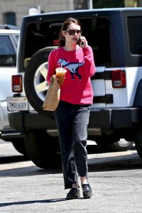 Emma Roberts in a Pink Sweater