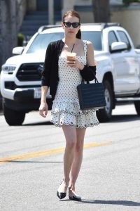 Emma Roberts in a Short White Polka Dot Dress