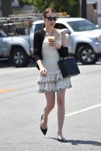 Emma Roberts in a Short White Polka Dot Dress