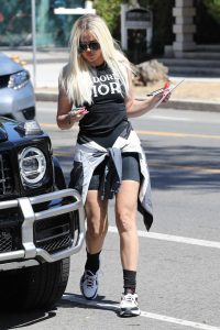 Khloe Kardashian in a Black Spandex Shorts