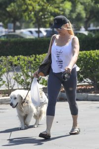 Nicollette Sheridan in a Gray Leggings