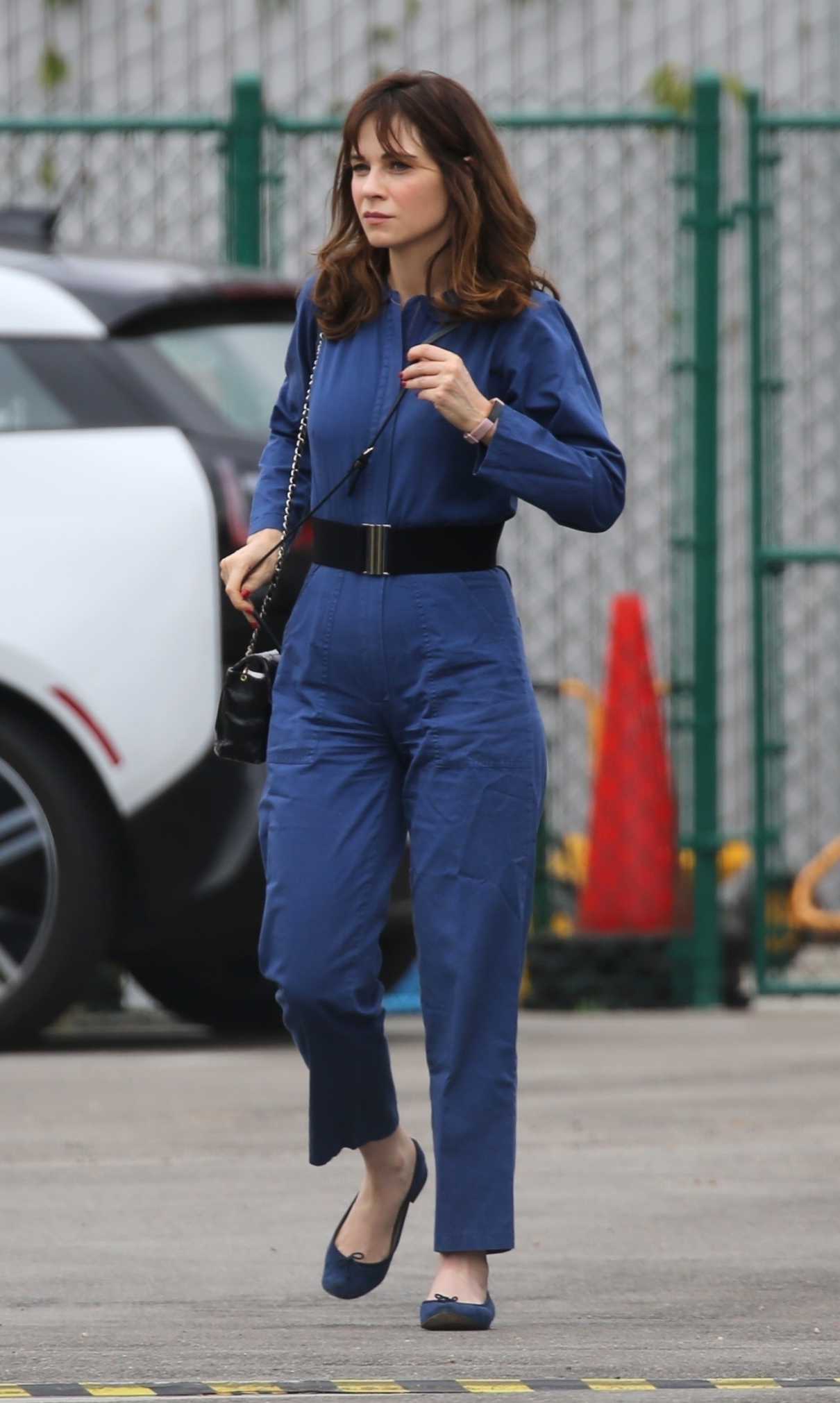 Zooey Deschanel in a Blue Jumpsuit