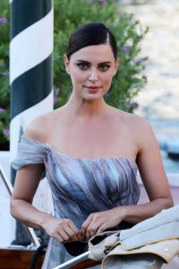 Catrinel Menghia in a Gray Dress