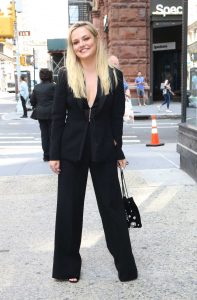 Emily Meade in a Black Suit