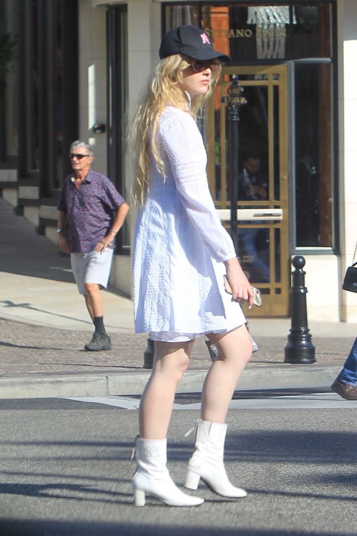 Kathryn Newton in a White Dress