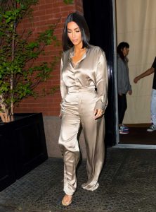 Kim Kardashian in a Gold Suit