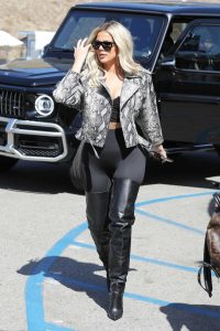 Khloe Kardashian in a Gray Snakeskin Jacket