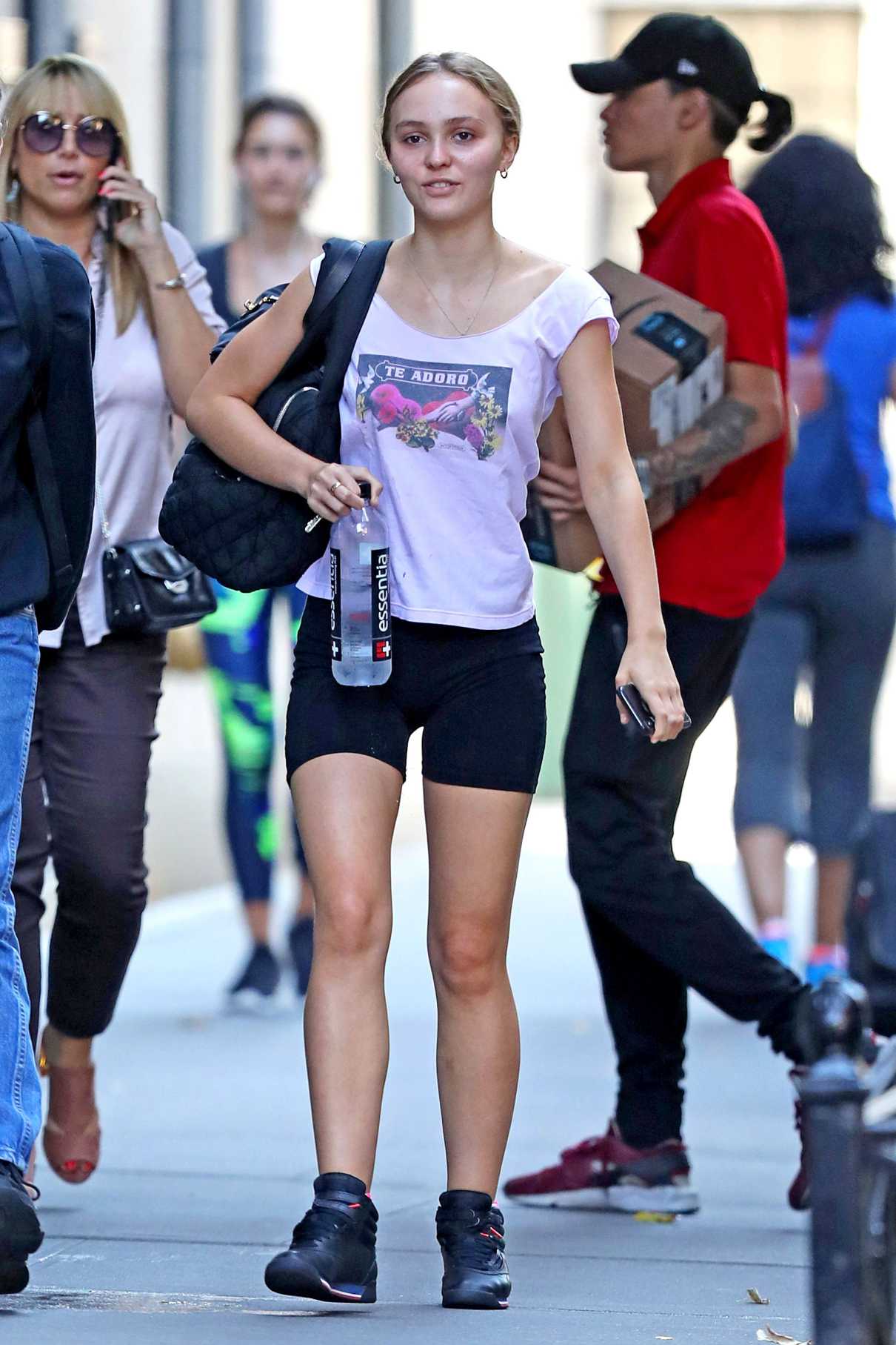 Lily-Rose Depp in a White Blouse