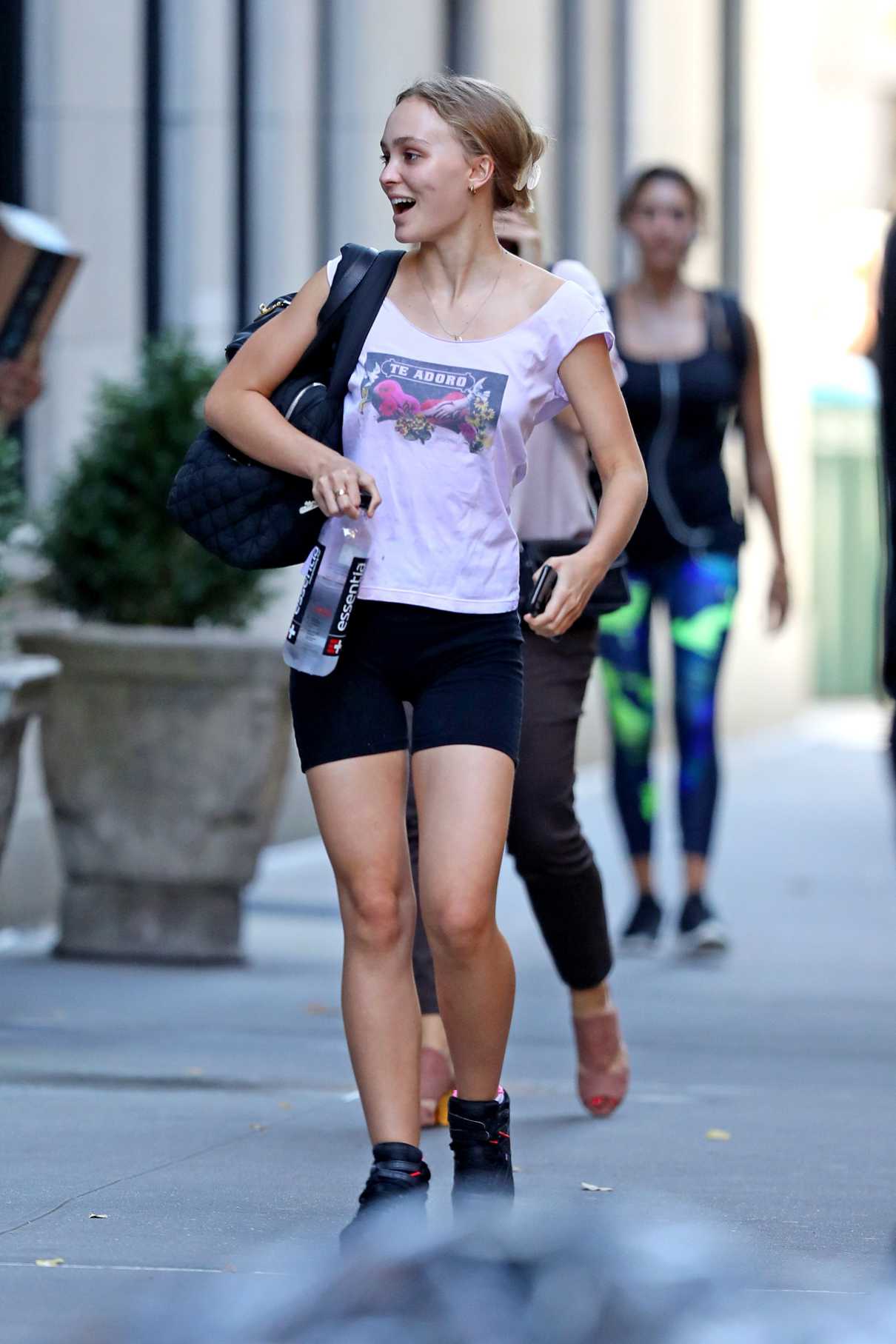 Lily-Rose Depp in a White Blouse Leaves Her Workout Session in NY 10/11