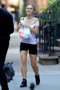 Lily-Rose Depp in a White Blouse