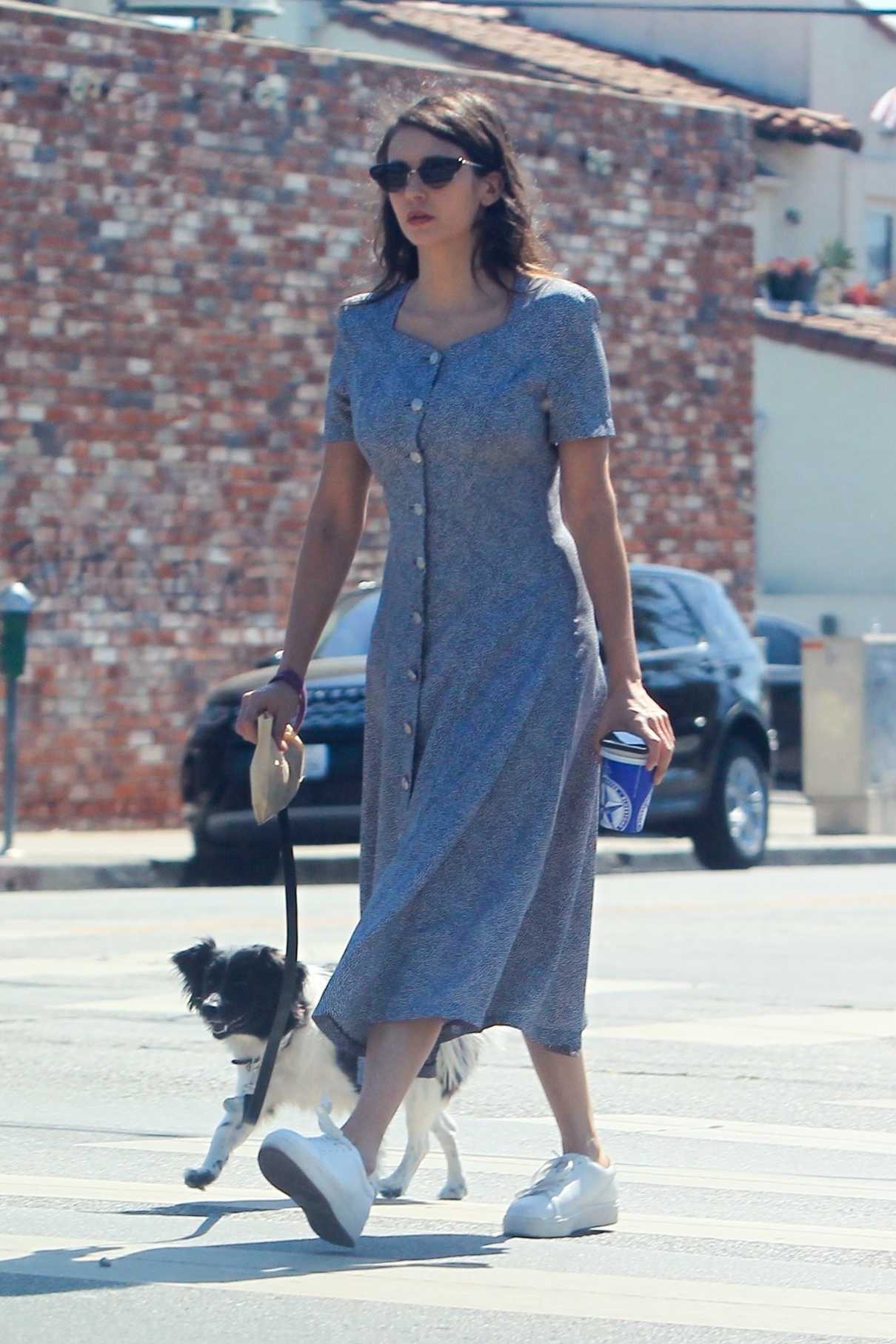 Nina Dobrev in a White Sneakers