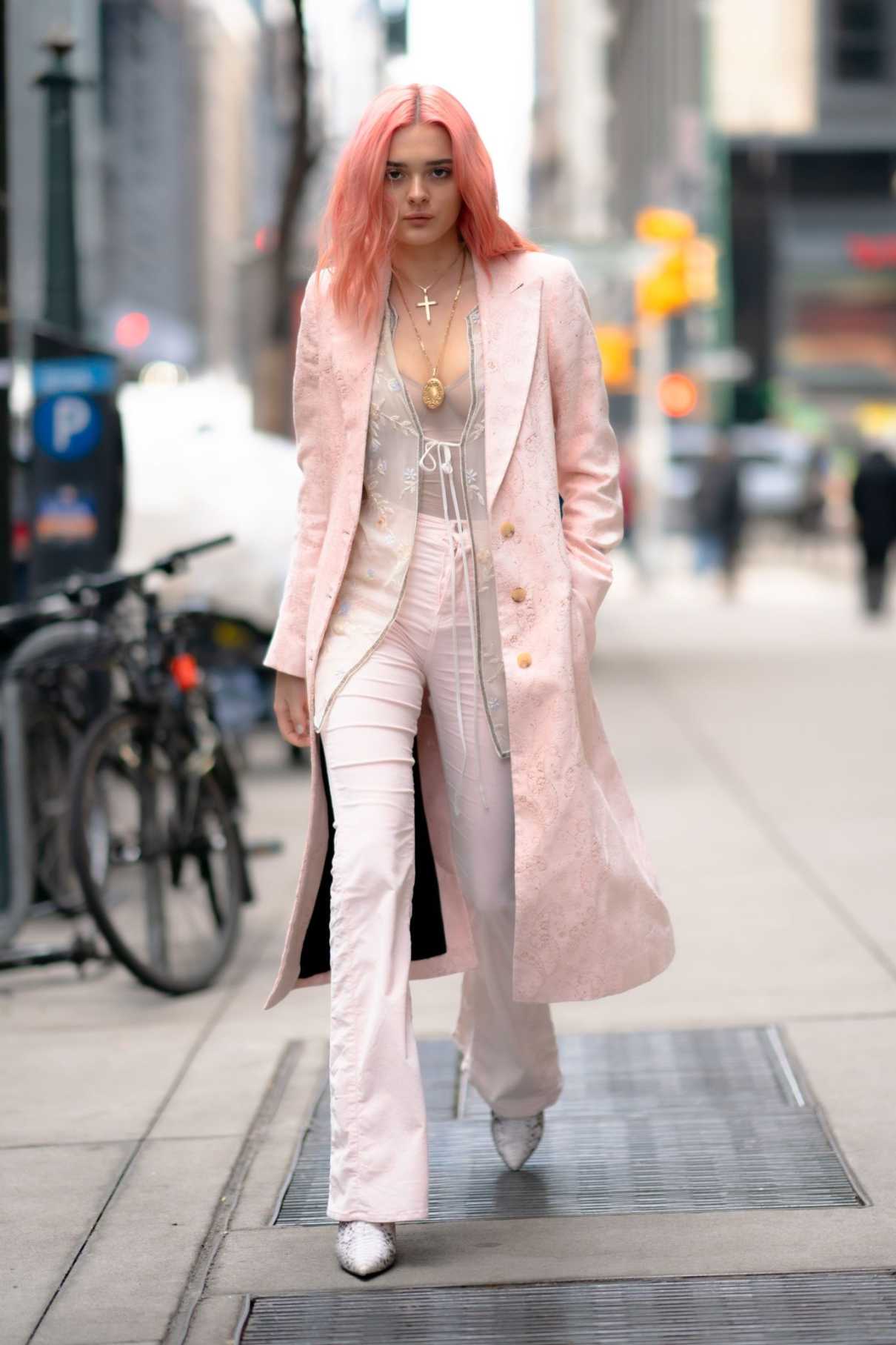 Charlotte Lawrence in a Pink Coat