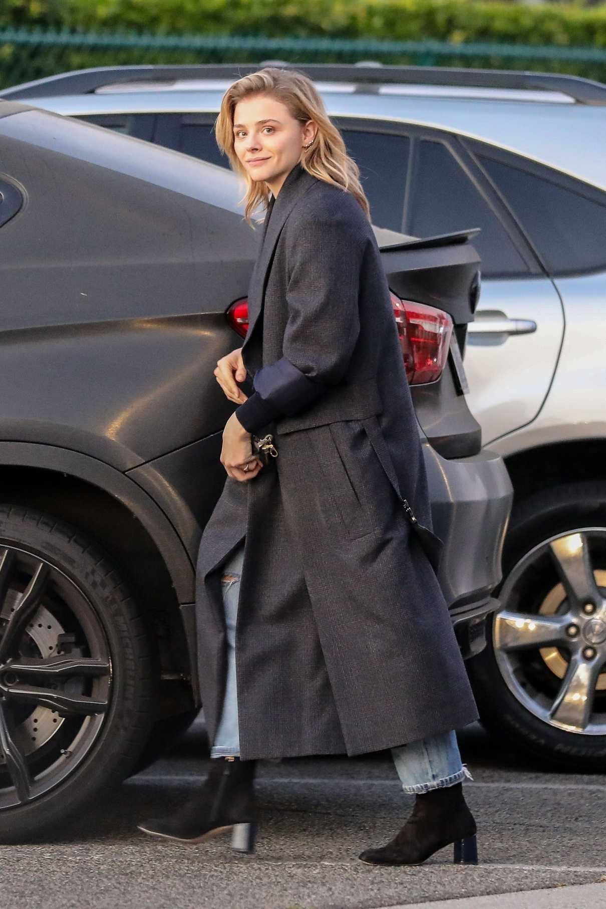 Chloe Moretz in a Black Coat
