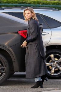 Chloe Moretz in a Black Coat