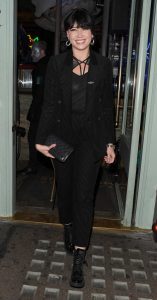 Daisy Lowe in a Black Striped Suit