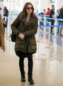 Lily Collins in a Black Boots