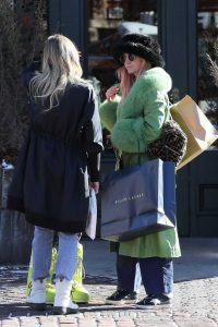 Ashlee Simpson in a Green Leather Coat