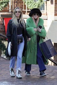 Ashlee Simpson in a Green Leather Coat