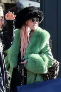 Ashlee Simpson in a Green Leather Coat