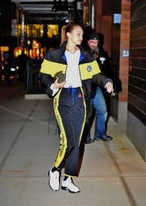 Gigi Hadid in a Black and Yellow Tracksuit