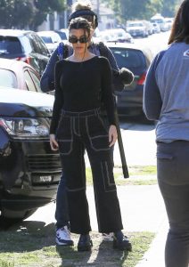 Kourtney Kardashian in a Black Blouse
