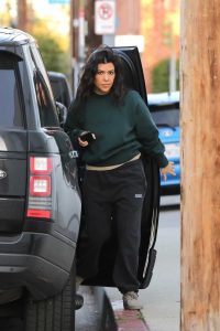 Kourtney Kardashian in a Black Sweatpants