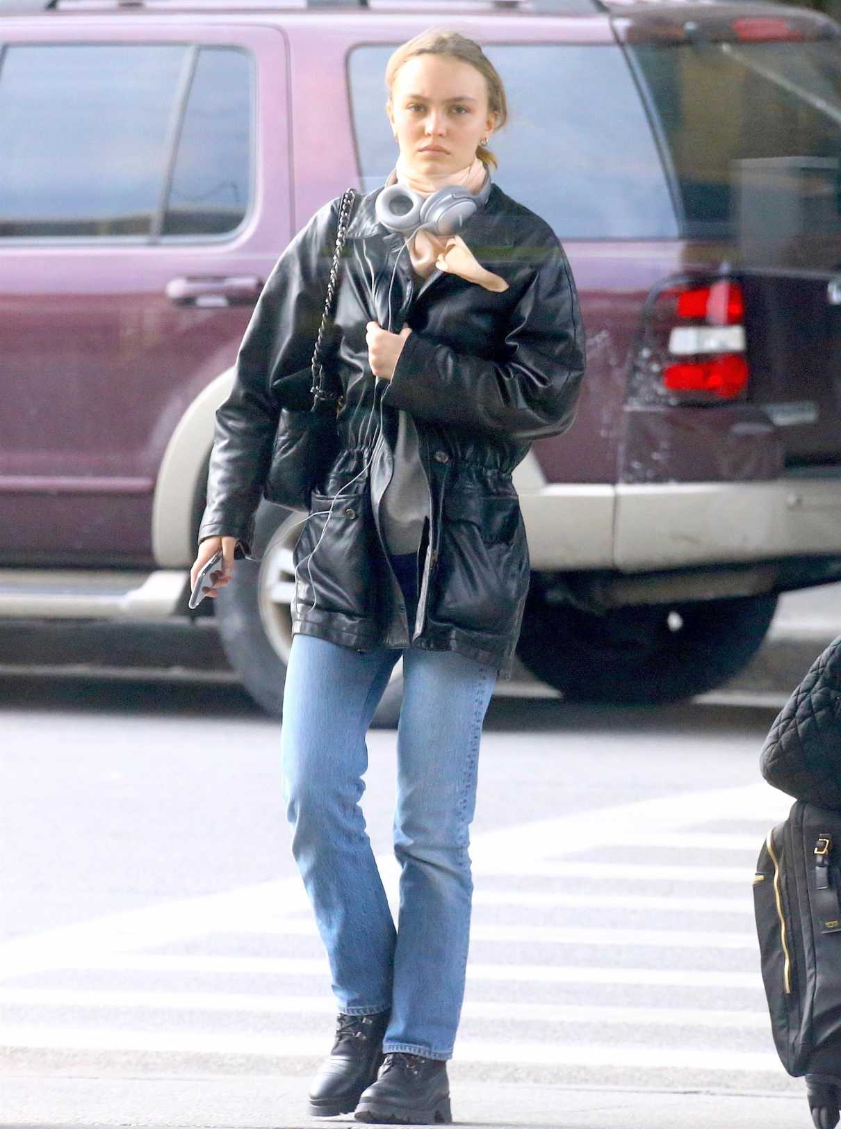 Lily-Rose Depp in a Black Leather Jacket