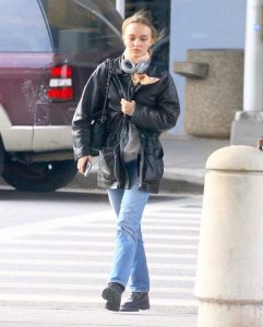 Lily-Rose Depp in a Black Leather Jacket