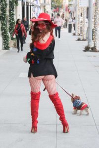 Phoebe Price in a Red Boots