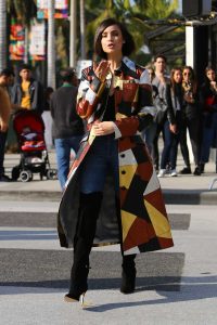 Sofia Carson in a Multicolor Coat