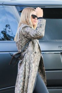 Sofia Richie in a Snakeskin Print Trench Coat