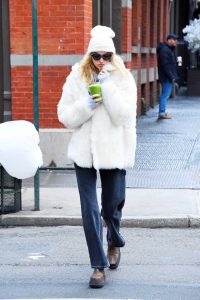 Elsa Hosk in a White Fur Jacket